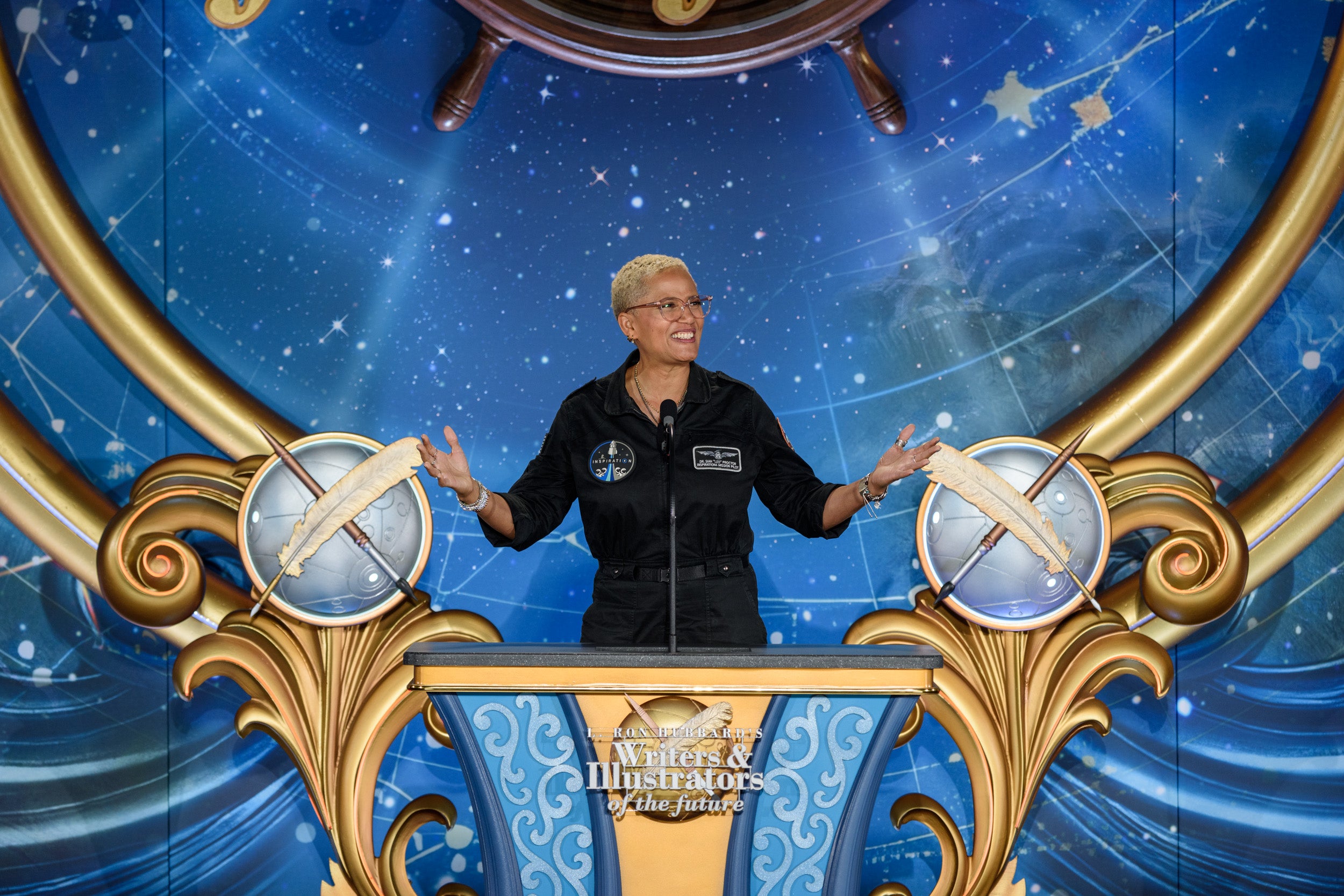 Load video: Astronaut and Space Poet Dr. Sian Proctor give the Keynote address at the 2025 Writers and Illustrators Gala.